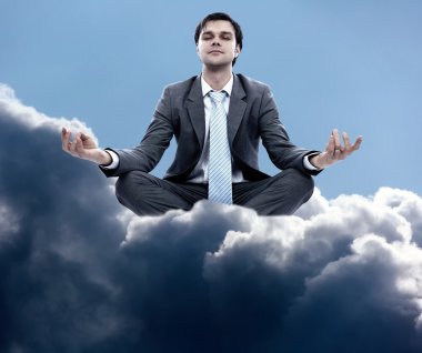Oturma ve meditasyon genç işadamı