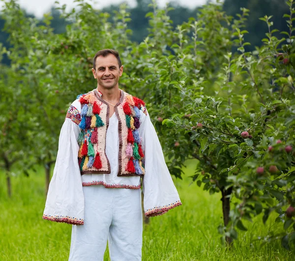 Farmer dressed in traditional costume — Stock Photo, Image