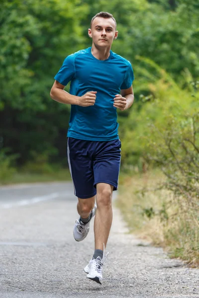 Young man running — Stock Photo, Image