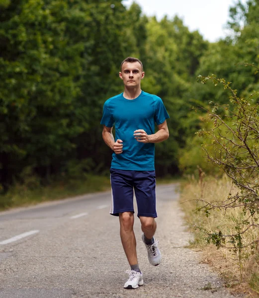 Young man running — Stock Photo, Image