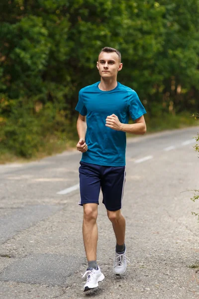 Young man running — Stock Photo, Image