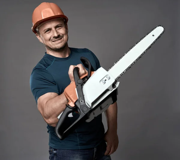 Worker Hardhat Holding Chainsaw Medium Size — Stock Photo, Image