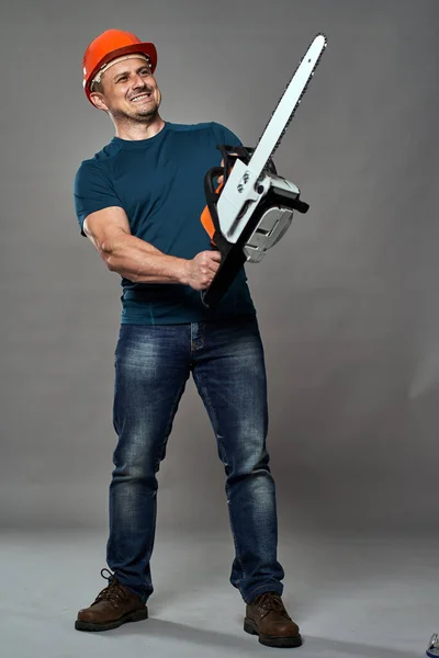 Worker Hardhat Holding Chainsaw Medium Size — Stock Photo, Image