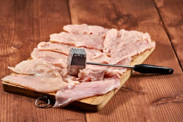 Closeup Chicken Breast Meat Tenderizer Wooden Board — Stock Photo, Image