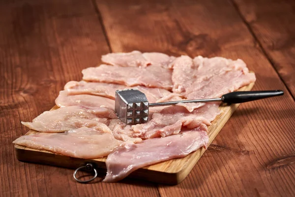 Closeup Chicken Breast Meat Tenderizer Wooden Board — Stock Photo, Image