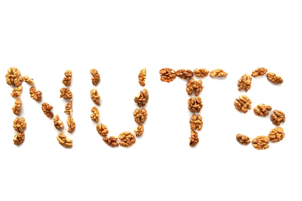 Slovo Nuts Napsané Vlašských Ořeších Bílém Pozadí — Stock fotografie