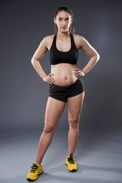 Young Pregnant Woman Doing Fitness Exercise Studio Shot Gray Background — 图库照片