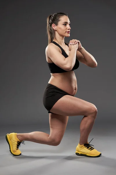 Young Pregnant Woman Doing Fitness Exercise Studio Shot Gray Background — Foto Stock