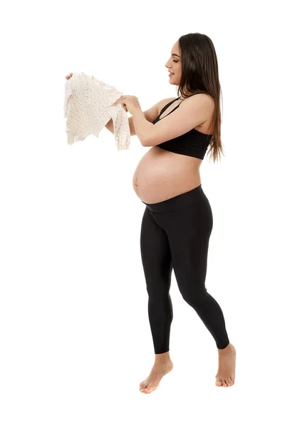 Zwangere Moeder Houden Van Haar Toekomstige Dochter Baby Kleren Geïsoleerd — Stockfoto