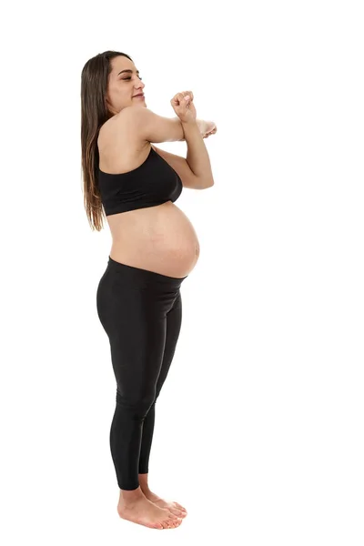 Jovem Grávida Fazendo Exercícios Fitness Para Gravidez Isolada Fundo Branco — Fotografia de Stock