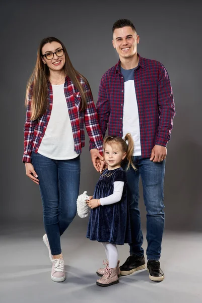 Happy Young Family Mother Father Little Daughter Studio Shot Gray — Stock Photo, Image