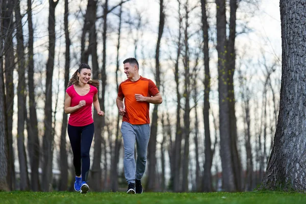 Athletic Attractive Young Couple Running Park — Stock Photo, Image