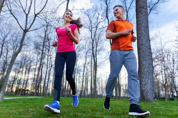 Athletic Attractive Young Couple Running Park — Stock Photo, Image