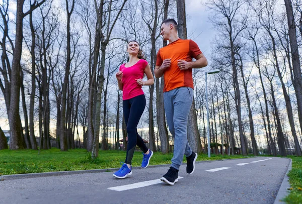 Athletic Attractive Young Couple Running Park — Stock Photo, Image