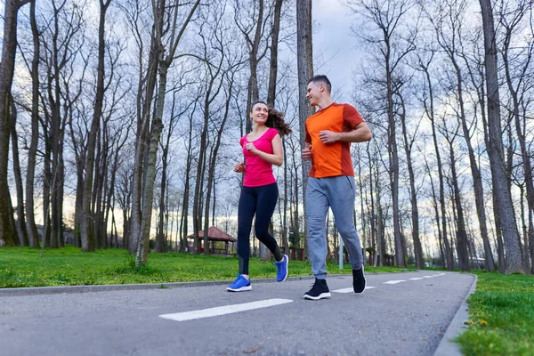 Athletic Attractive Young Couple Running Park — Stock Photo, Image