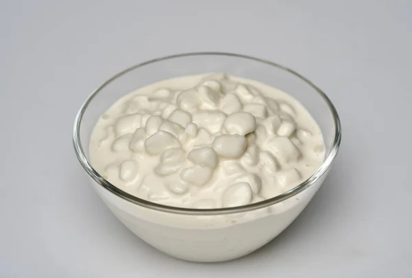 Closeup Grained Cottage Cheese Glass Bowl White Background — Stock Photo, Image