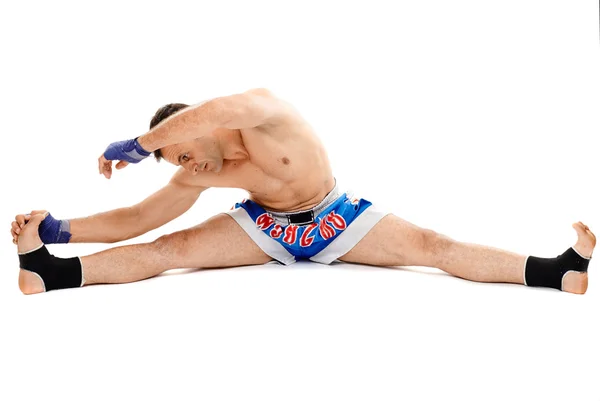 Kickbox fighter stretching — Stock Photo, Image