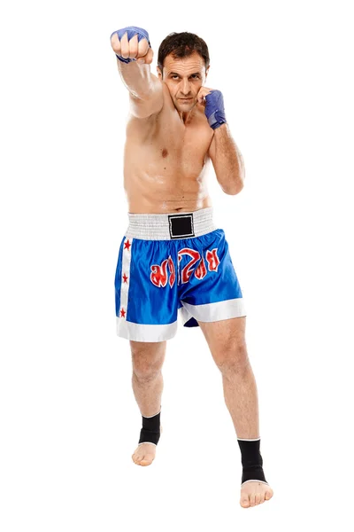 Kickbox fighter executing a punch — Stock Photo, Image