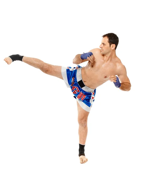 Kickbox fighter executing a kick — Stock Photo, Image