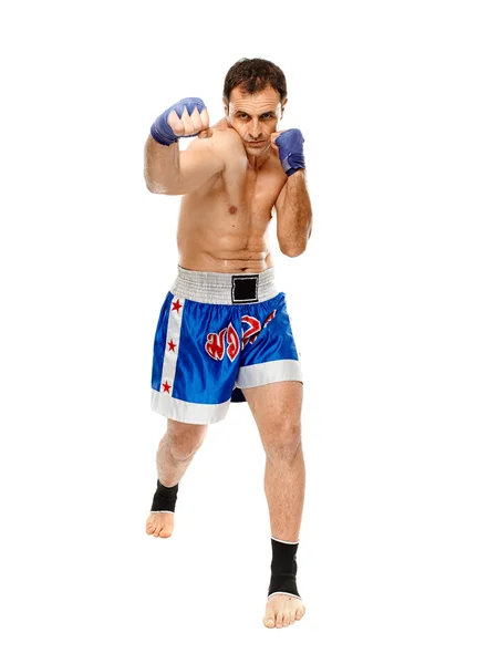 Kickbox fighter executing a punch — Stock Photo, Image