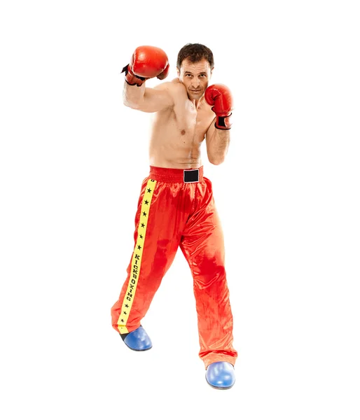 Kickbox fighter executing a punch — Stock Photo, Image