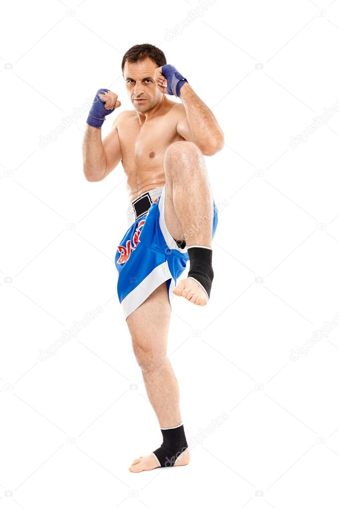 Kickbox fighter executing a kick