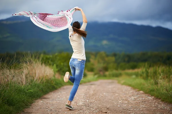 Portrait of a young woman outdoor dancing — Stock Photo, Image