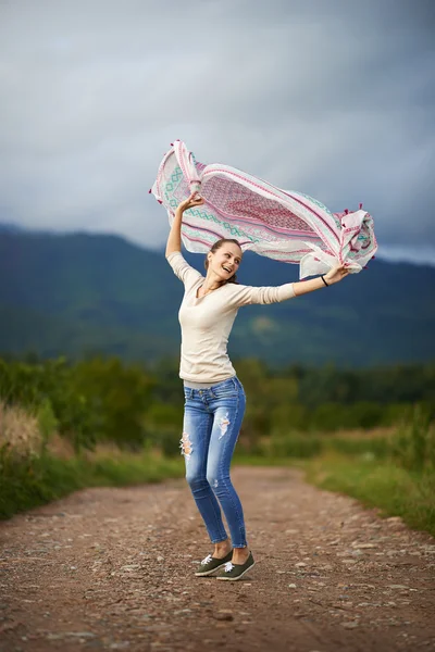 Portrait of a young woman outdoor dancing — Stock Photo, Image