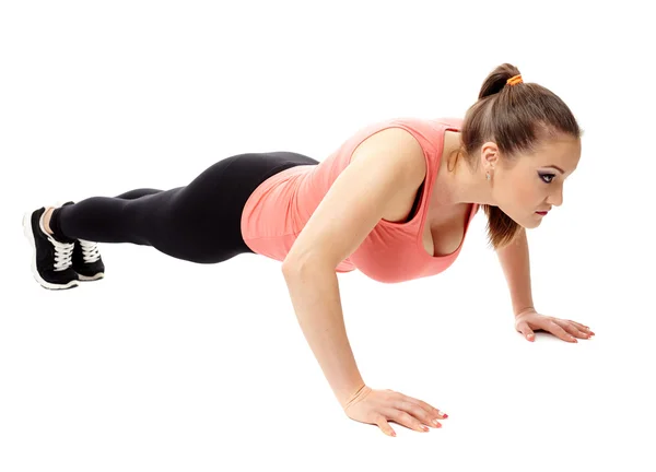 Fille faire pushups — Photo