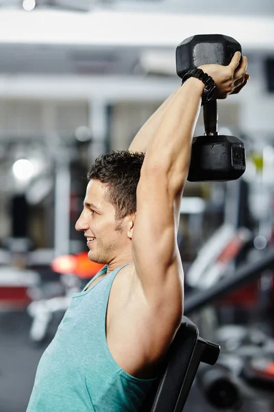 Shoulder workout with dumbbell — Stock Photo, Image