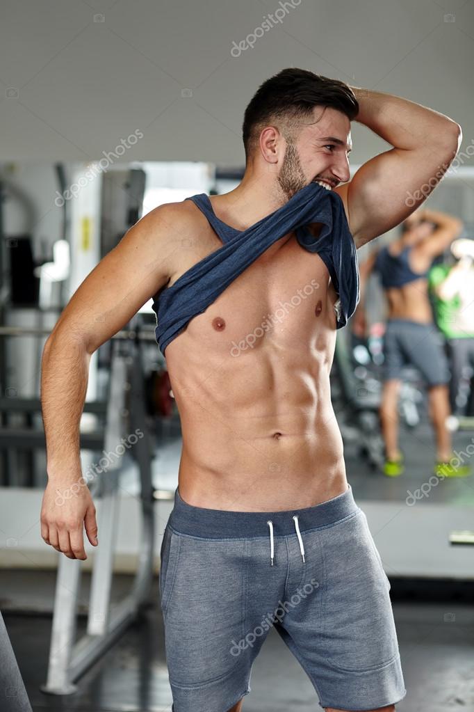 Showing off abs Stock Photo by ©Xalanx 61589275