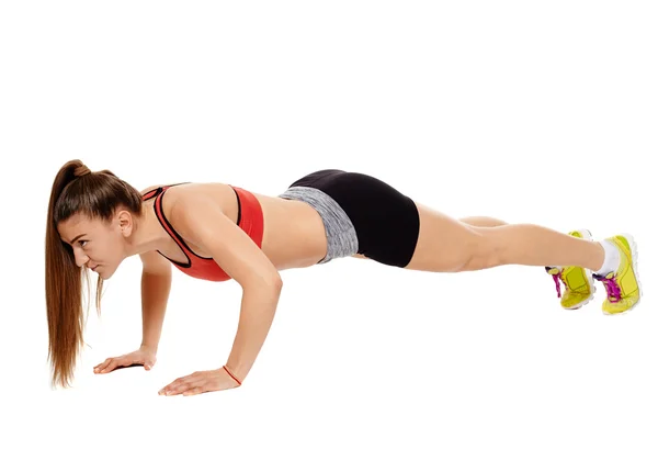 Girl doing pushups — Stock Photo, Image