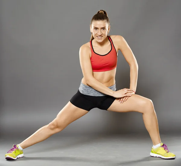 Fitness signora stretching — Foto Stock
