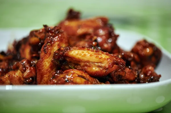 Caramelized asian chicken wings — Stock Photo, Image