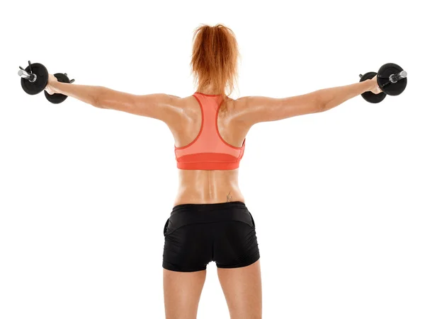 Joven mujer en forma haciendo ejercicio con pesas —  Fotos de Stock