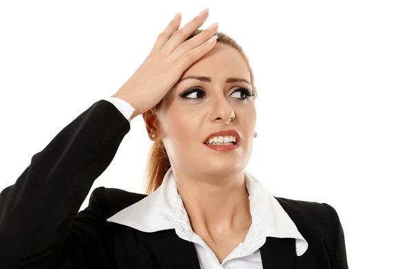 Businesswoman having a headache Royalty Free Stock Photos