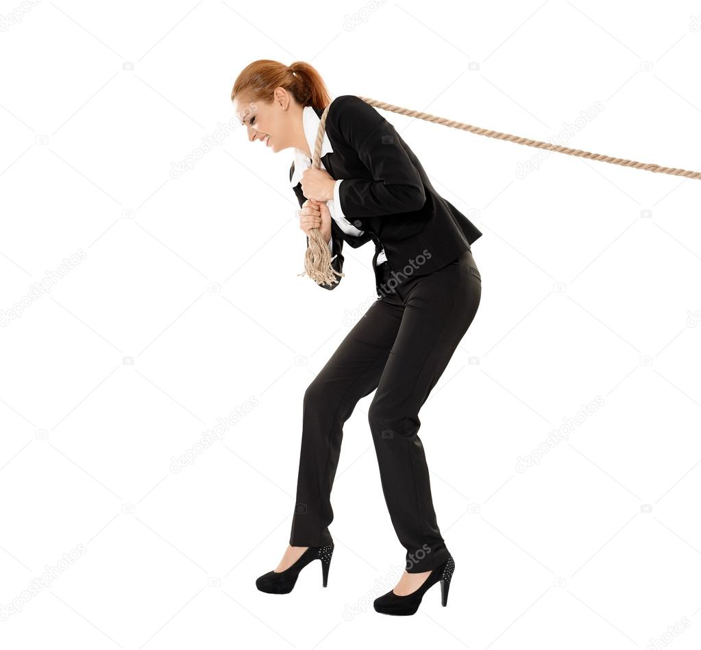 Businesswoman pulling a rope