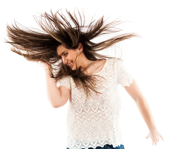 Mujer volteando su cabello — Foto de Stock