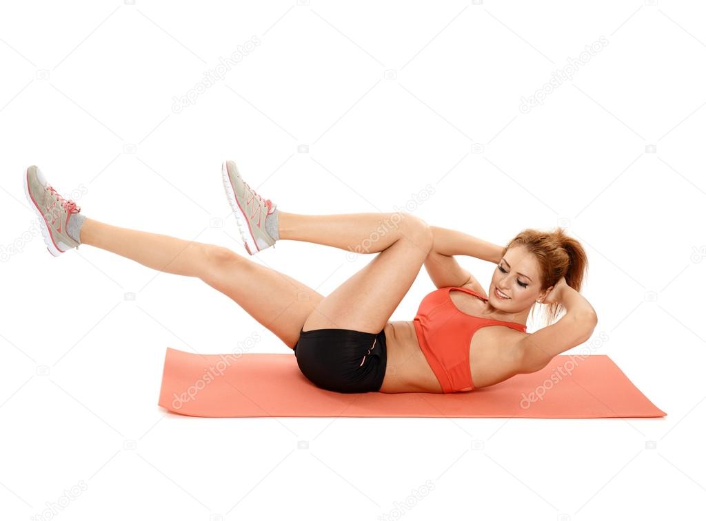 Woman doing exercises on a mat