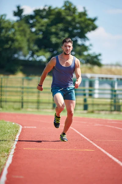 Joven atleta corredor —  Fotos de Stock