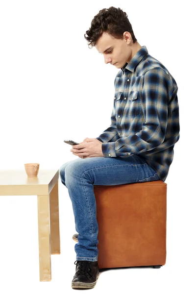 Teenage boy texting — Stock Photo, Image