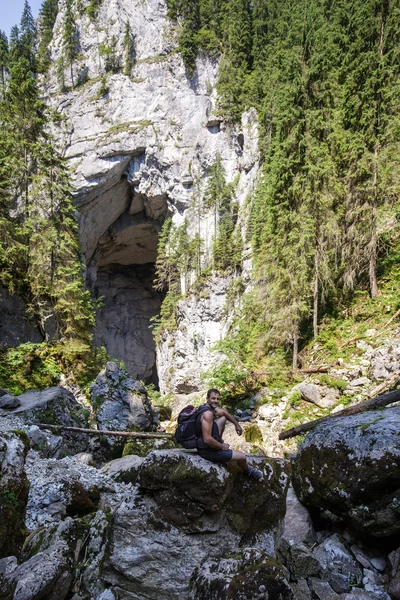 Man  near the cave — Stock Photo, Image