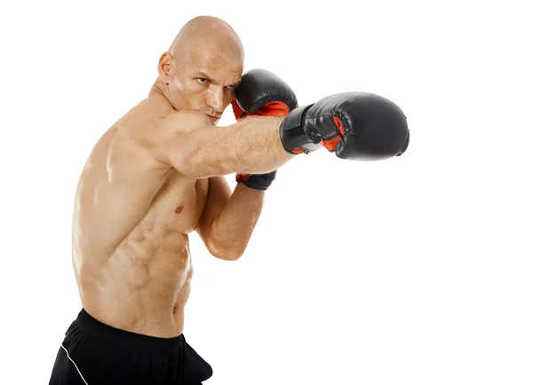 Muy en forma kickboxer perforación —  Fotos de Stock