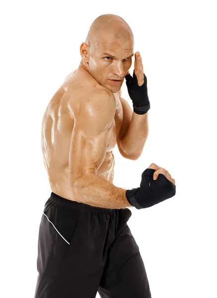 Muy en forma kickboxer perforación — Foto de Stock