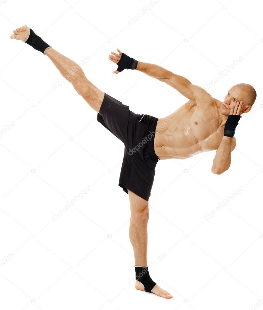 Kickboxer executing a powerful kick