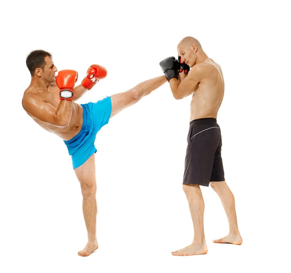 Två kickboxing fighters sparring — Stockfoto