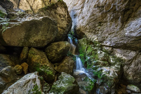 Underground river and waterfall — Stock Photo, Image