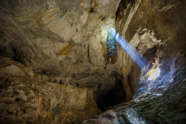 Cave with sunlight entering — Stock Photo, Image