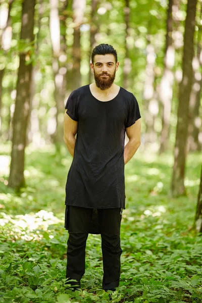 Fashionable man in the oak forest — Stock Photo, Image