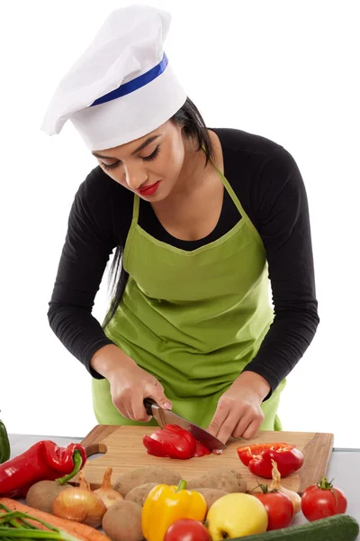 Mujer chef cortar verduras Fotos De Stock